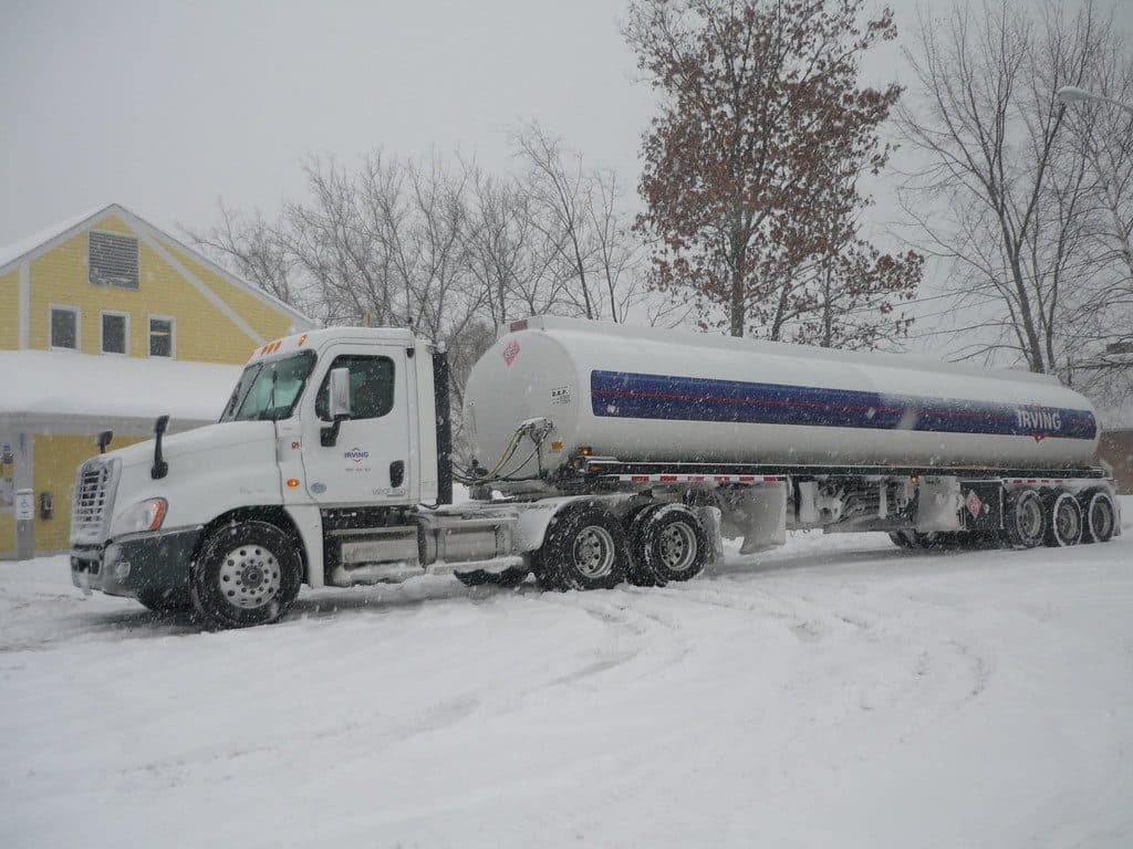 Tractor and tanker in snowy conditions